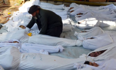 Daugiau nei tūkstantis taikių gyventojų žuvo Damasko priemiestyje, kai rajoną atakavo raketos su cheminiu ginklu. „Reuters“ nuotr.