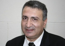 Sirijos nacionalinės koalicijos narys Kamalis al Labvanis. Es.amnesty.org nuotr.