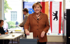 Vokietijos parlamento rinkimuose savo valią pareiškė ir A. Merkel. EPA-ELTA nuotr.