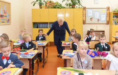 LR prezidentė Dalia Grybauskaitė tea didelė megėja fotografuotis su moksleiviais.
