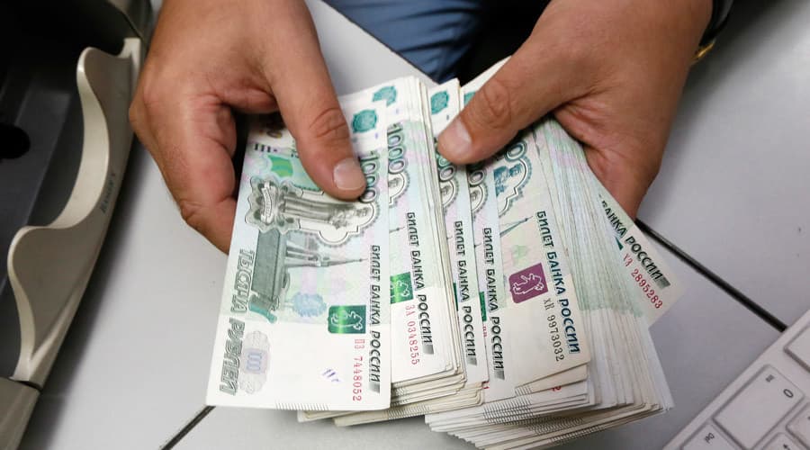 Kinija pasienio su Rusija mieste vietoje JAV dolerių naudoja juanius ir rublius